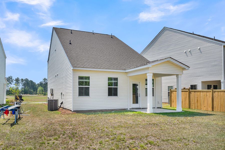 Exterior details and patio area of a home in Wildcat Chase, Summerville (Image 20).