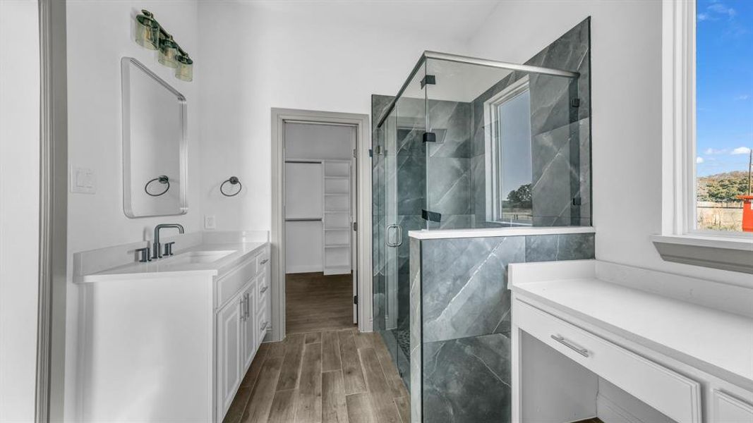 Double sinks for convenience & a walk-in shower!