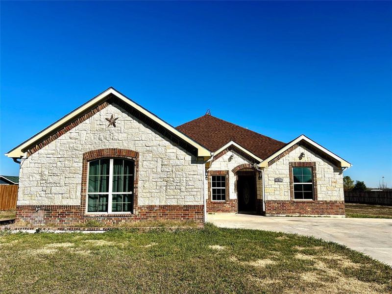 View of front of home with a front lawn