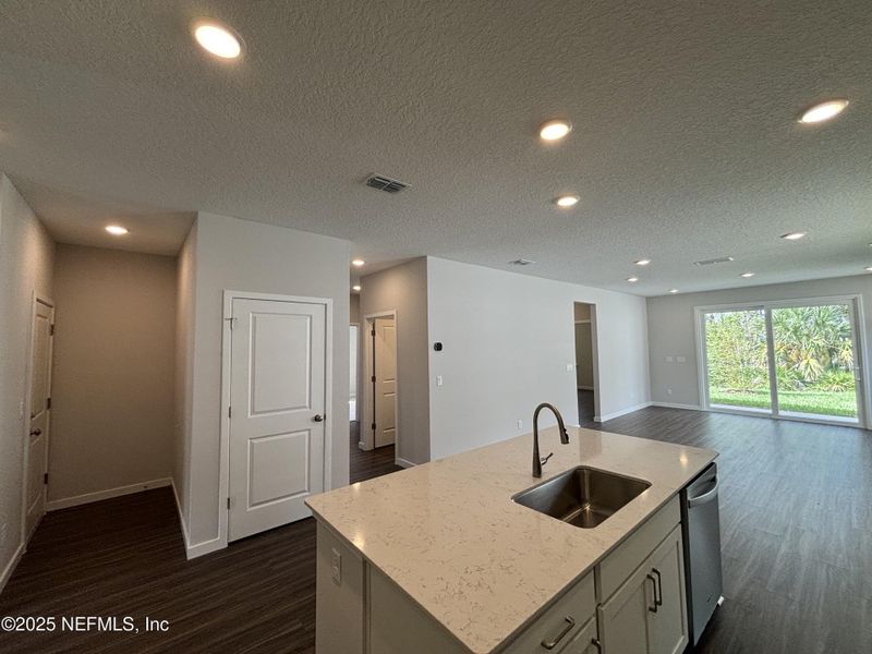 Furnished interior view inside a new home in The Magnolia Series at Reserve East, Flagler Beach (Image 8).