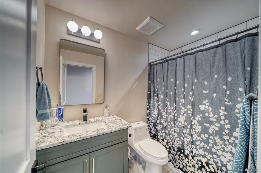 Full bath between bedroom 2 & 3