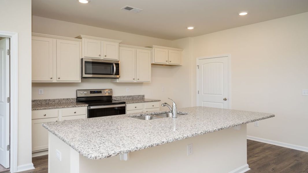 Representative furnished interior of a home built from the ARIA by D.R. Horton in Island Green, Myrtle Beach (Image 9).