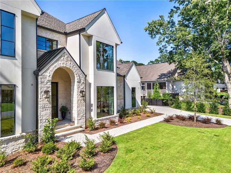 Front exterior of a new home in , Alpharetta, GA, highlighting curb appeal (Image 33). Front exterior of a new home in , Alpharetta, GA, highlighting curb appeal (Image 33).