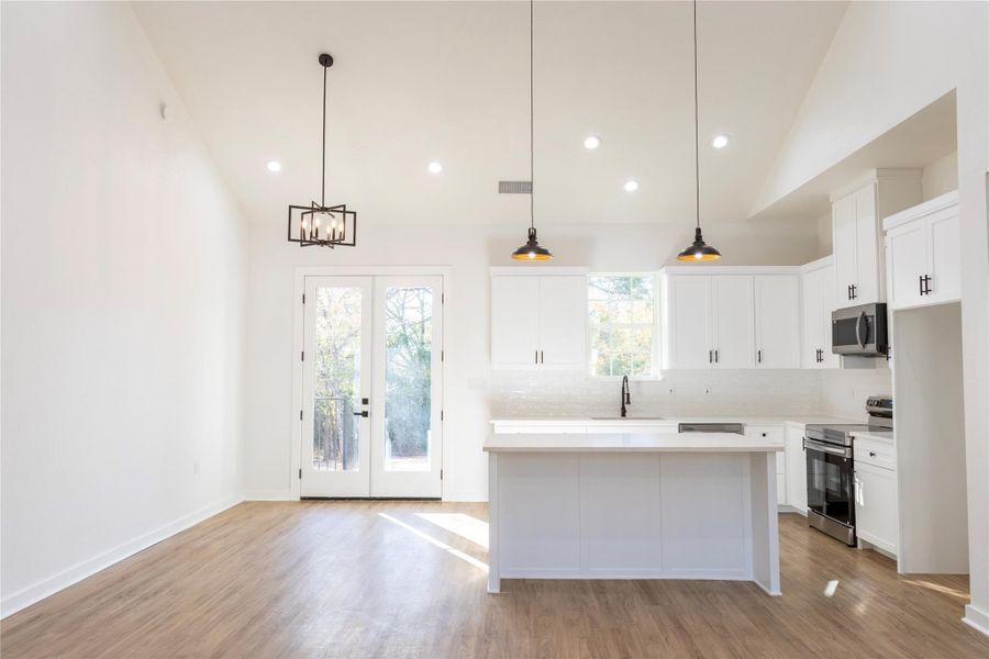 Additional angle of the living room with seamless open floor design.