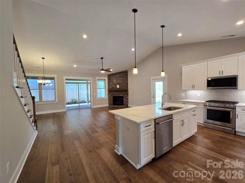 Kitchen to Great Room and Sliders to Covered Rear Patio Kitchen to Great Room and Sliders to Covered Rear Patio