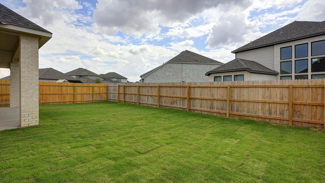 Exterior details and patio area of a home in Alsatian Oaks 50', Castroville (Image 2).