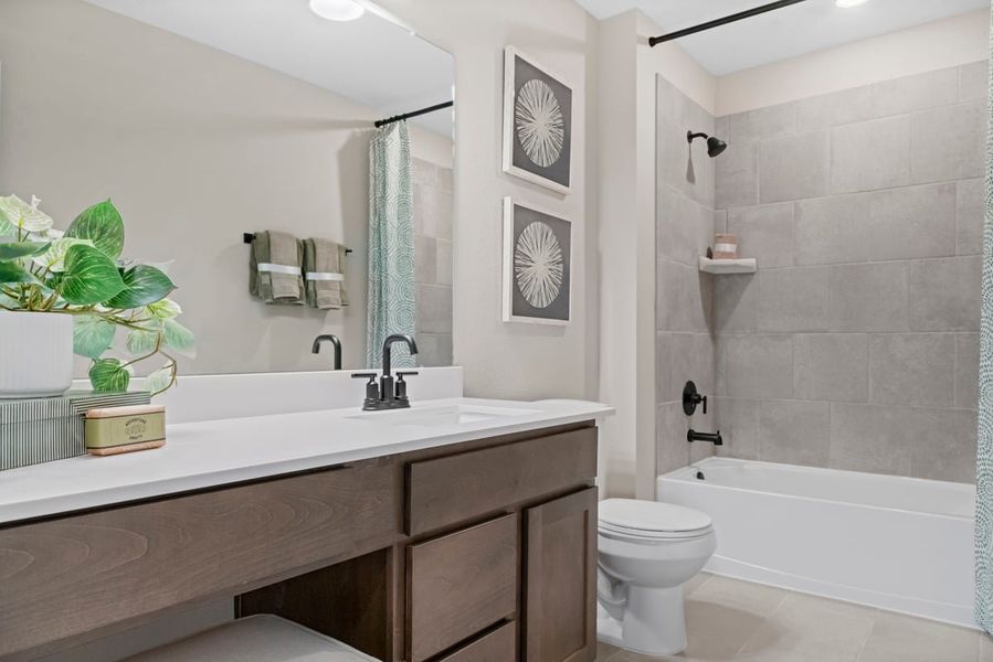 Representative furnished interior of a home built from the 1780 Modeled by KB Home in Oakwood Trails, Tomball (Image 6).