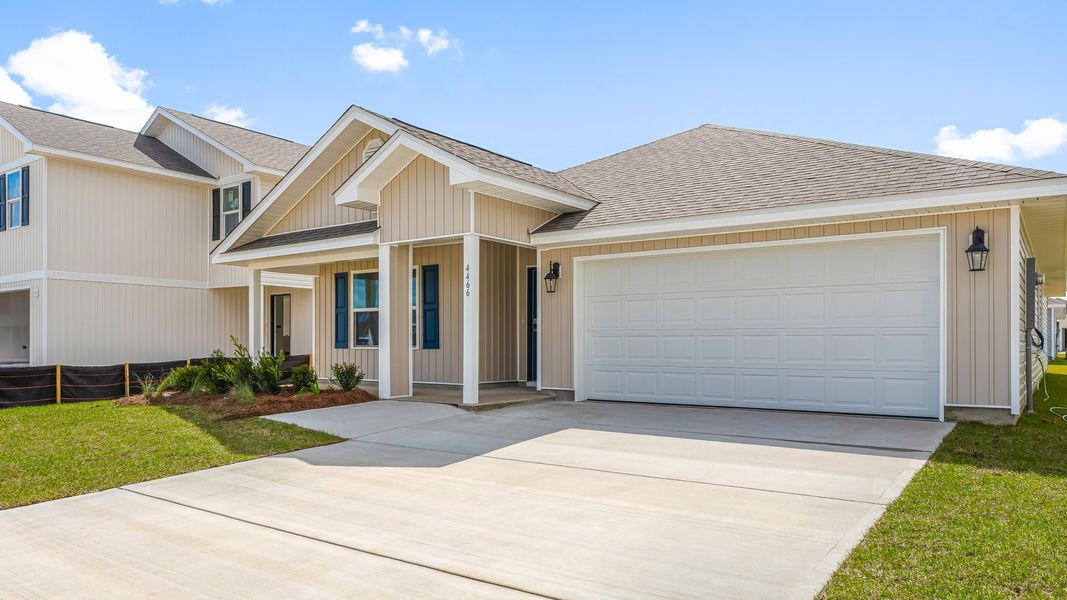 Front exterior of a new home in Destini Lane, Panama City, FL, highlighting curb appeal (Image 16).