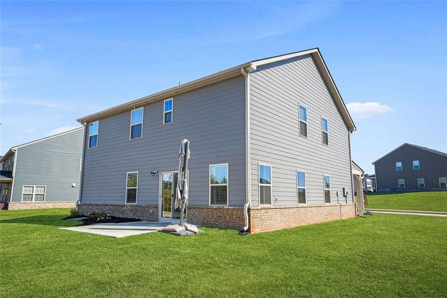 Exterior details and patio area of a home in Southern Hills, McDonough (Image 3).