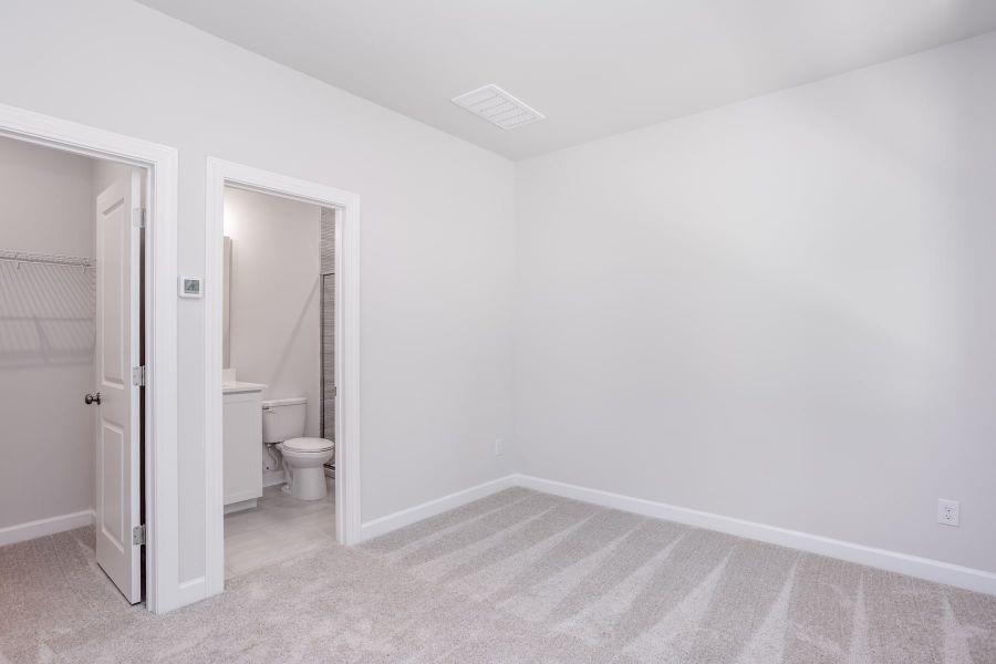 Representative unfurnished interior of a home built from the Kinston by Tri Pointe Homes in Elm Park, Raleigh (Image 18).
