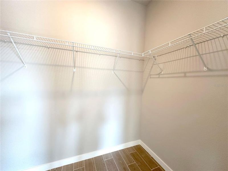 Primary Walk-In Closet Primary Walk-In Closet