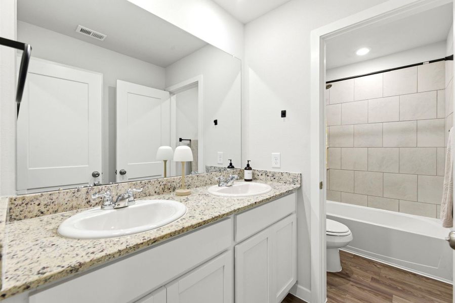 Furnished interior view inside a new home in Lakes at Black Oak, Magnolia (Image 14). Furnished interior view inside a new home in Lakes at Black Oak, Magnolia (Image 14).
