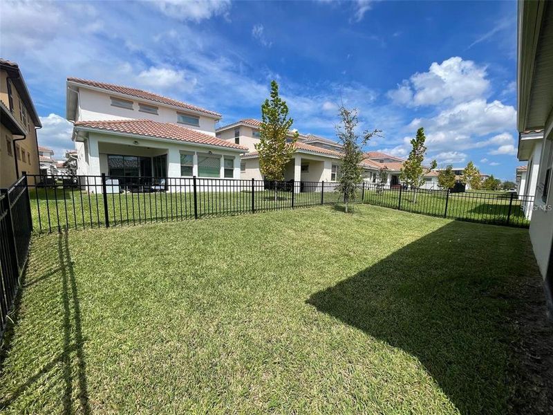 Exterior details and patio area of a home in , Orlando (Image 1).