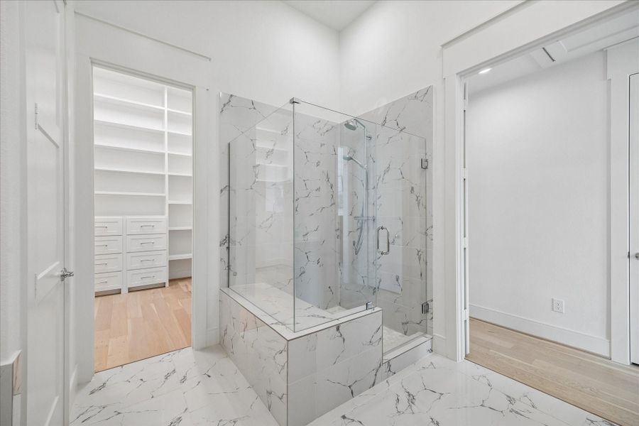 Large, stand-alone shower with a bench. Large, stand-alone shower with a bench.