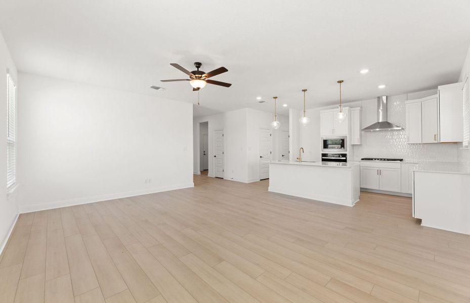 Representative unfurnished interior of a home built from the Orchard by Pulte Homes in Saddleback at Santa Rita Ranch, Liberty Hill (Image 17).