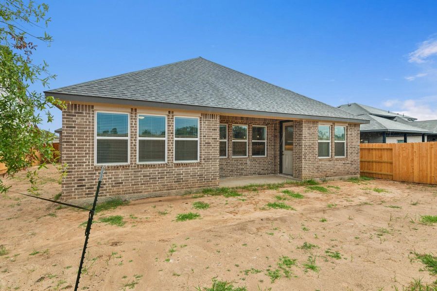 Backyard with covered patio Backyard with covered patio