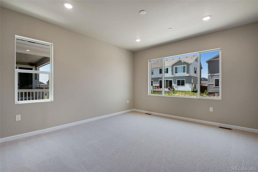 Spacious, unfurnished interior of a new home in Reunion Ridge, Commerce City (Image 41).