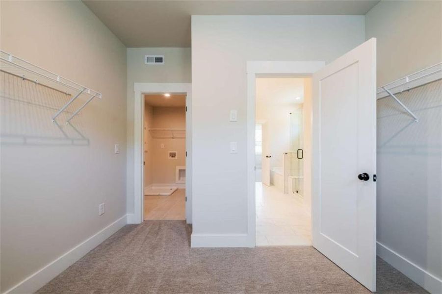 Spacious, unfurnished interior of a new home in The Paddocks at Doc Hughes, Buford (Image 28).