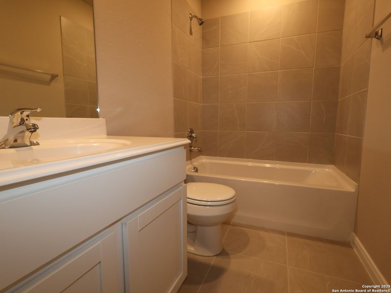 Furnished interior view inside a new home in Greenspoint Heights, Seguin (Image 8).