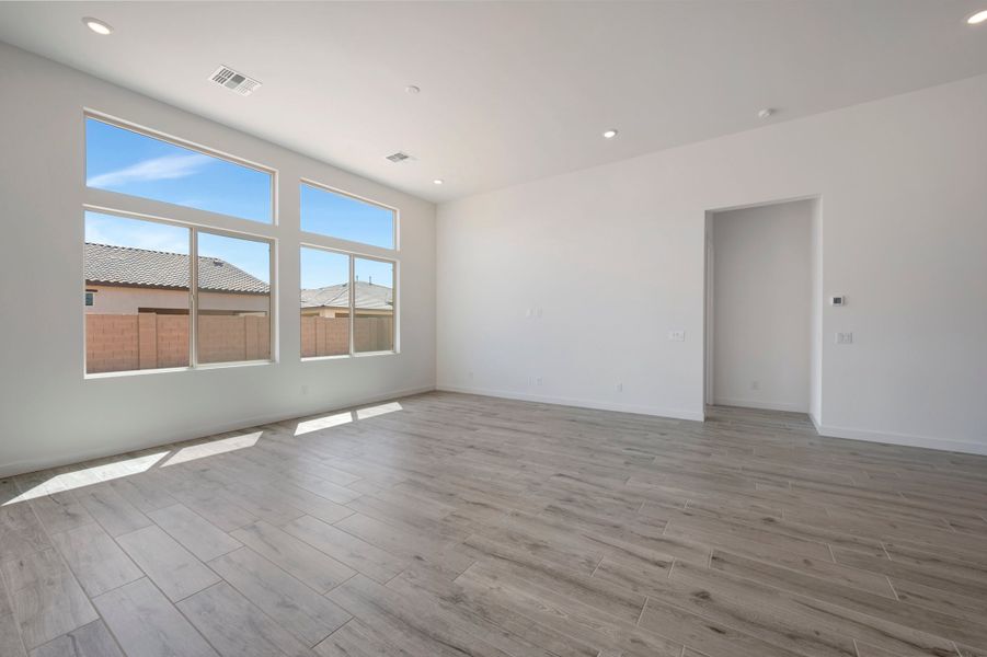 Spacious, unfurnished interior of a new home in Blossom Rock, Apache Junction (Image 26). Spacious, unfurnished interior of a new home in Blossom Rock, Apache Junction (Image 26).