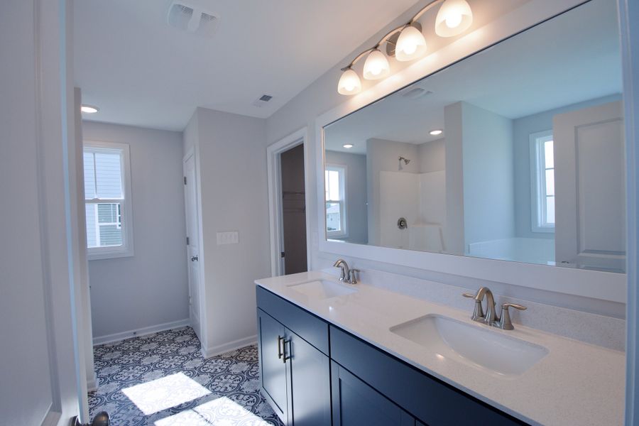 Representative furnished interior of a home built from the Naples by Stevens Fine Homes in River Tide Farms, Bolivia (Image 22).