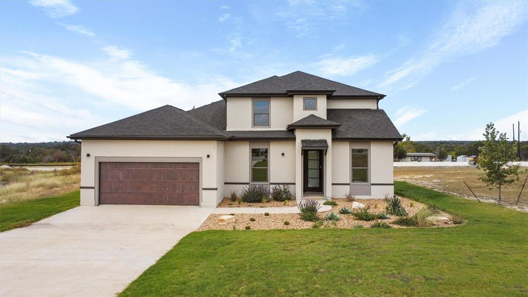 Front exterior of a new home in , Georgetown, TX, highlighting curb appeal (Image 27). Front exterior of a new home in , Georgetown, TX, highlighting curb appeal (Image 27).
