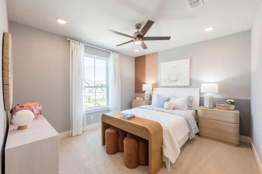 Representative furnished interior of a home built from the Woodbridge by Tri Pointe Homes in Bridgeland, Cypress (Image 38).