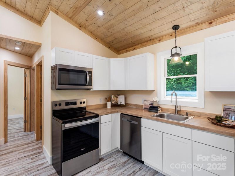 Furnished interior view inside a new home in , Waynesville (Image 10).