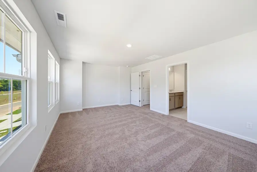 Spacious, unfurnished interior of a new home in Sweetbrier, Durham (Image 24).
