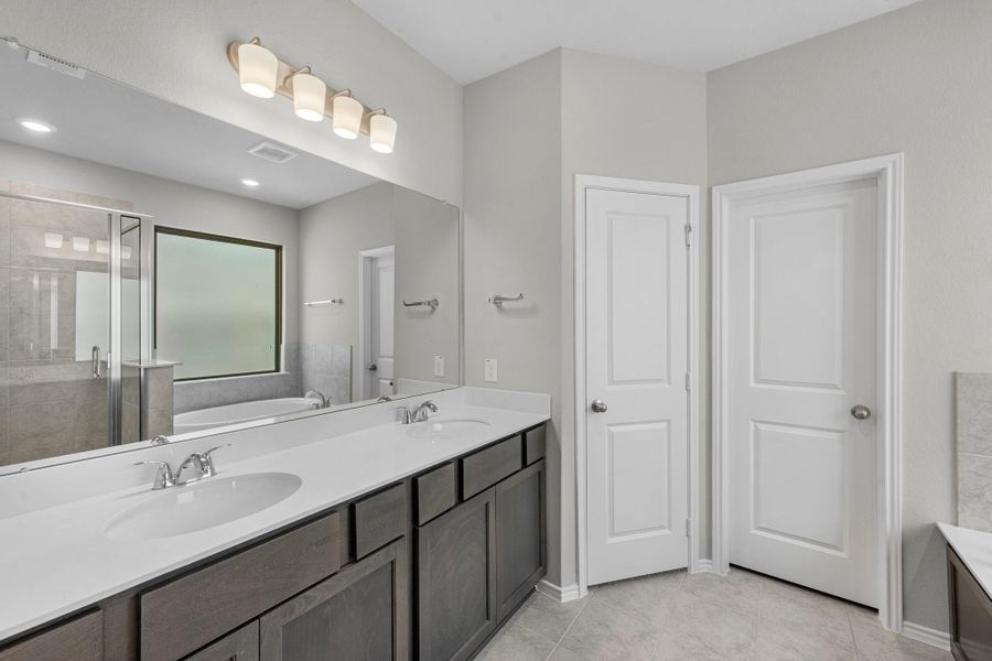 Additional view of the roomy primary bathroom.