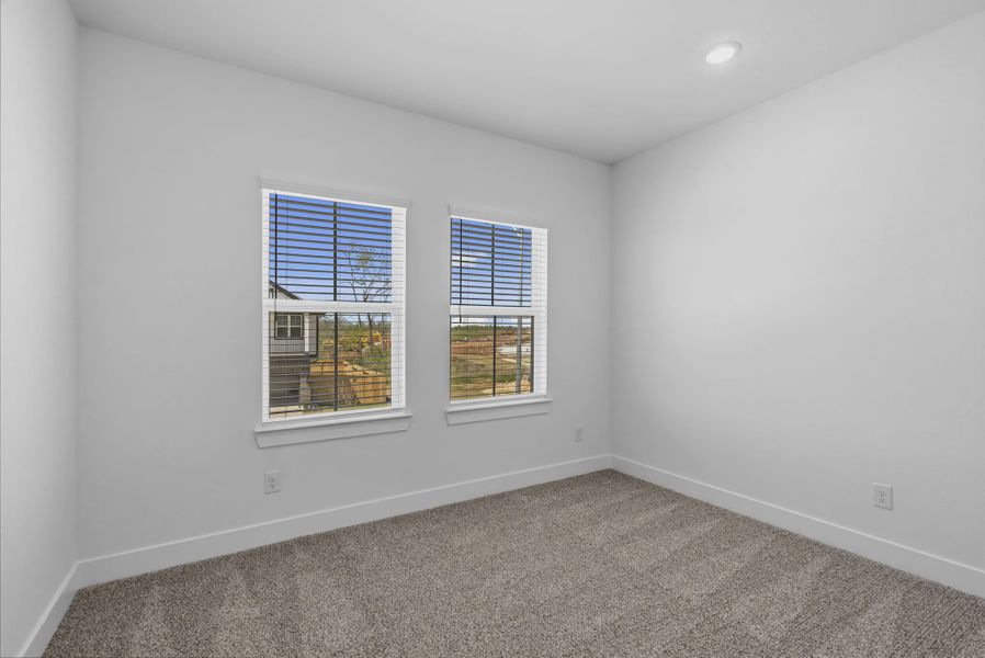 Representative unfurnished interior of a home built from the Dillon by Chesmar Homes in Sienna Courtyard, Missouri City (Image 19).