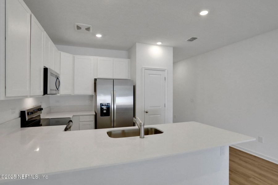 Furnished interior view inside a new home in , Jacksonville (Image 6).