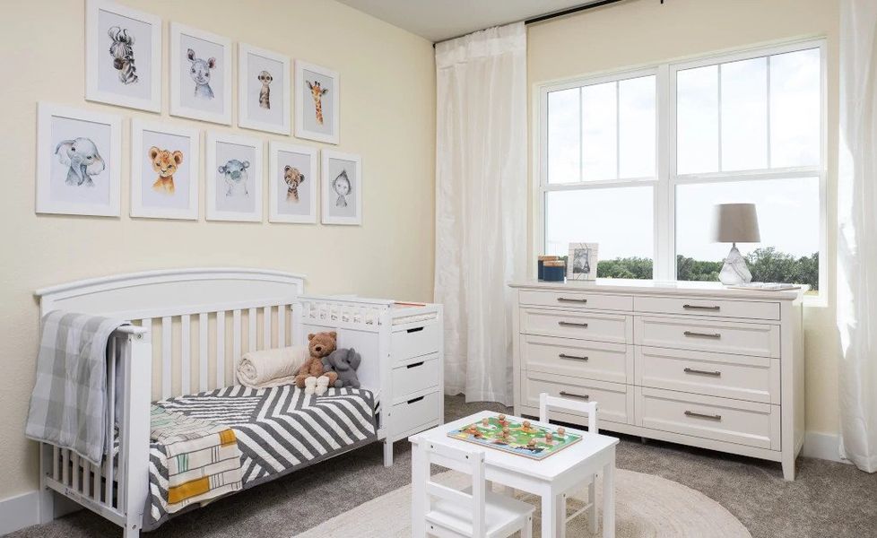 Representative furnished interior of a home built from the Blue Jay by Ashton Woods in Lariat, Liberty Hill (Image 13).