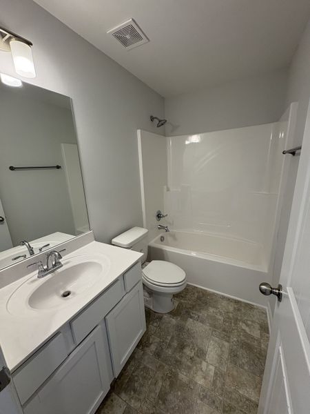 Photo is of the model home to show what the completed floor plan looks like. Selections and Options may vary.