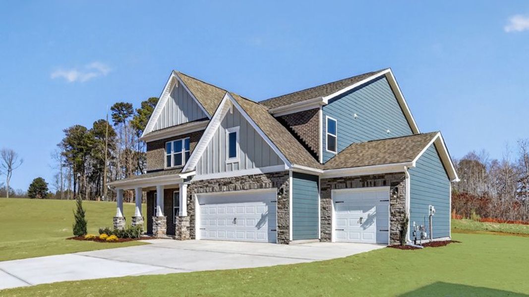 Representative exterior photo of a completed home built from the Hampshire by D.R. Horton in The Manors at Winston Pointe, Clayton, NC (Image 18).