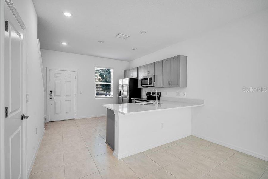 Furnished interior view inside a new home in The Townhomes at Skye Ranch, Sarasota (Image 12).