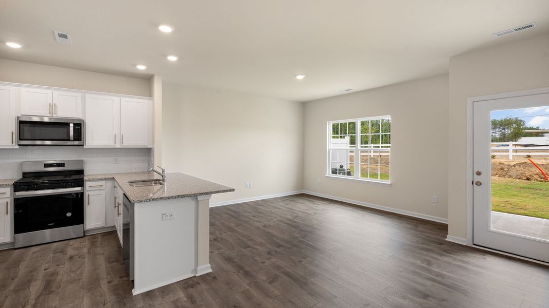 Furnished interior view inside a new home in Clock Road Townhomes, New Bern (Image 9). Furnished interior view inside a new home in Clock Road Townhomes, New Bern (Image 9).