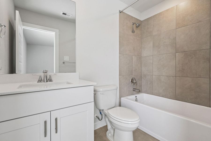 Furnished interior view inside a new home in Landing Meadows - Premier Series, New Caney (Image 12). Furnished interior view inside a new home in Landing Meadows - Premier Series, New Caney (Image 12).