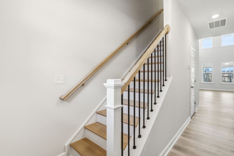 Spacious, unfurnished interior of a new home in Ovation at Sweetbrier, Durham (Image 15).