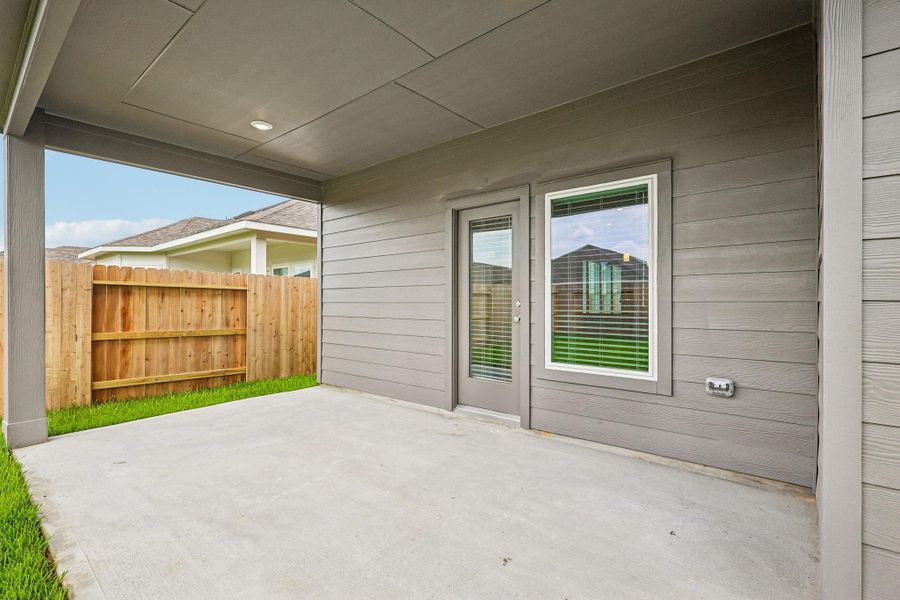 Exterior details and patio area of a home in Riviera Pines - Premier Series, Huffman (Image 19).