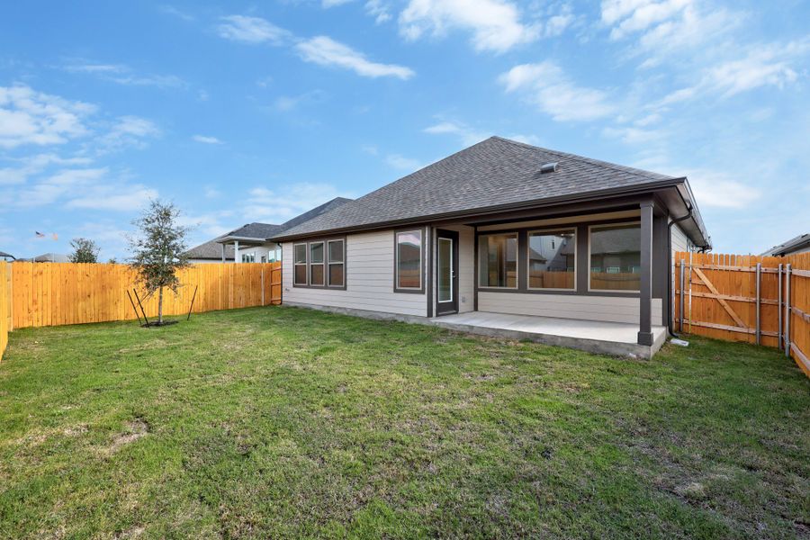 Exterior details and patio area of a home in Prairie Winds, Hutto (Image 24).