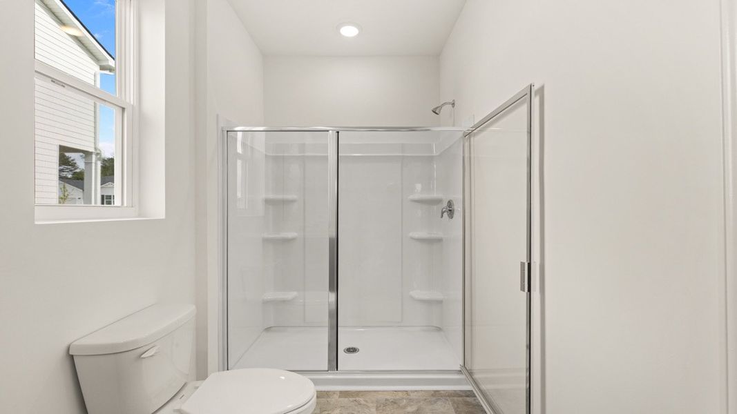 Representative furnished interior of a home built from the Kerry by D.R. Horton in Champion's Run, Lithonia (Image 4).