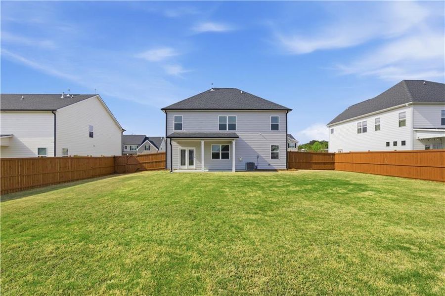 Exterior details and patio area of a home in Independence, Loganville (Image 3).