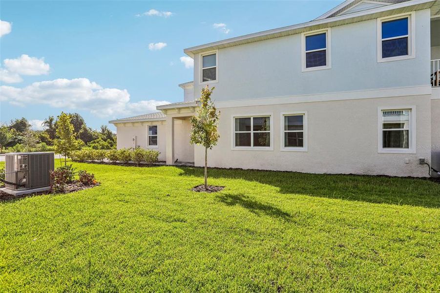 Exterior details and patio area of a home in Lagoon Residences at Epperson, Wesley Chapel (Image 25).