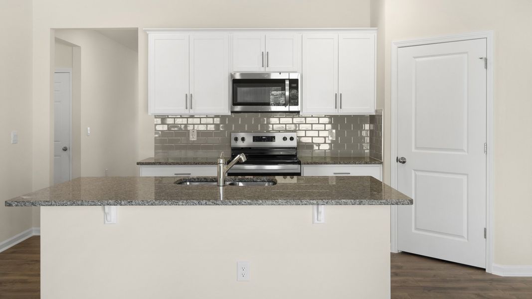 Furnished interior view inside a new home in The Grove at Matthews Landing, Fuquay Varina (Image 5).