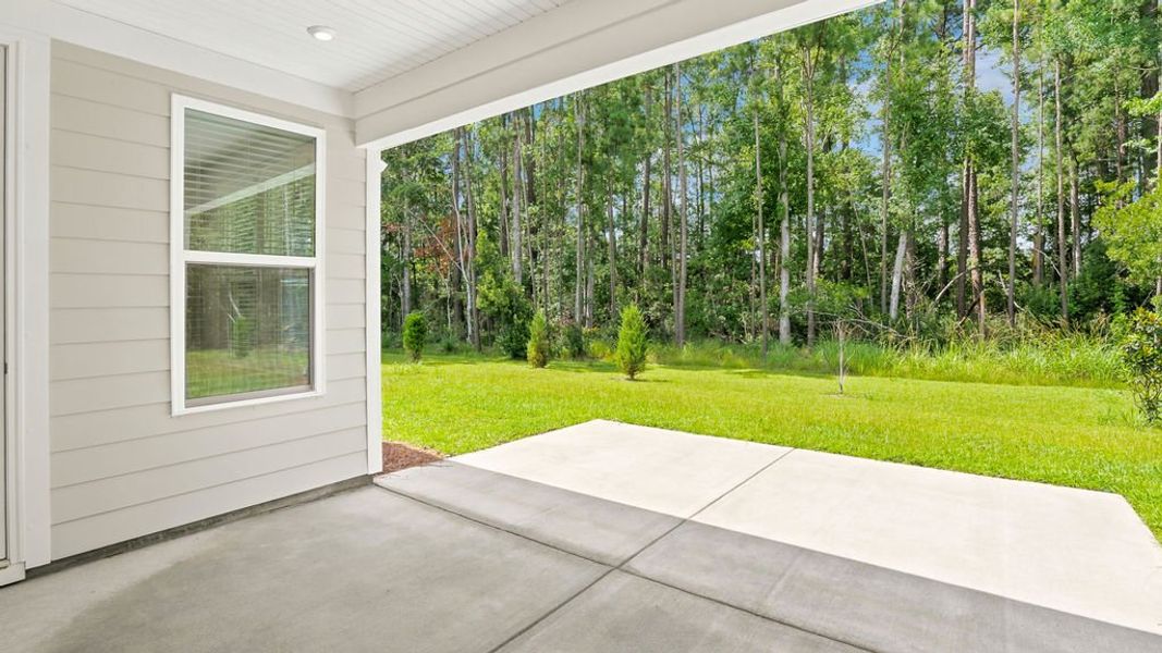 Exterior details and patio area of a home in Midpoint at New Riverside, Bluffton (Image 32). Exterior details and patio area of a home in Midpoint at New Riverside, Bluffton (Image 32).