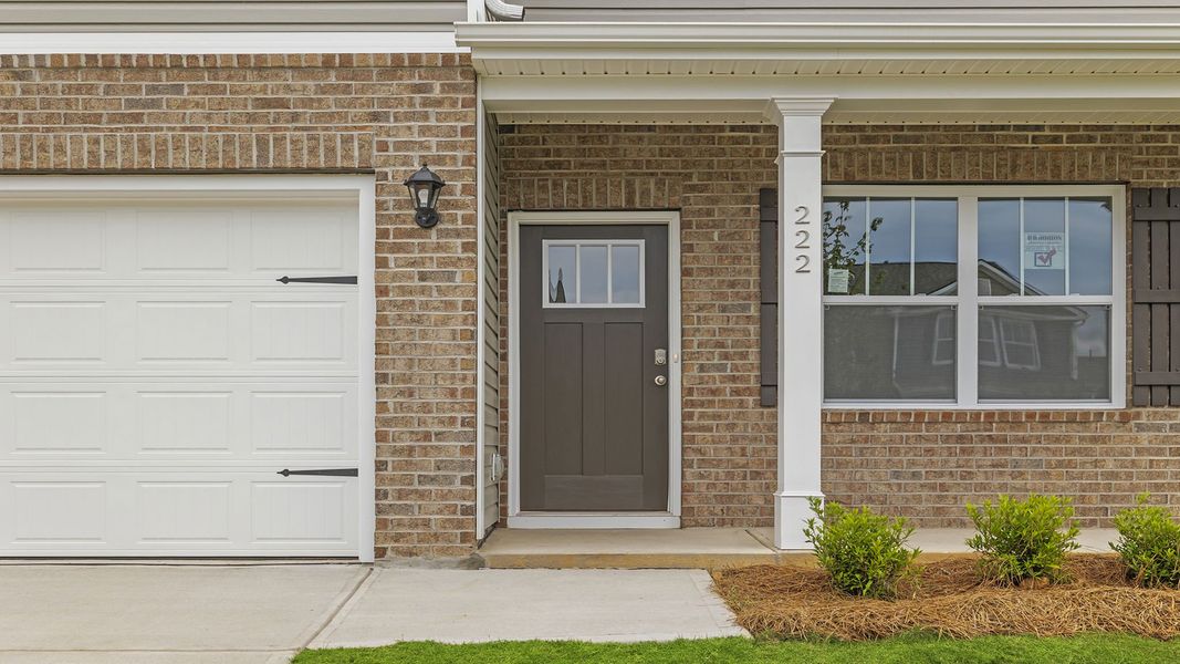 Exterior details and patio area of a home in Durbin Meadows Traditions, Fountain Inn (Image 2). Exterior details and patio area of a home in Durbin Meadows Traditions, Fountain Inn (Image 2).