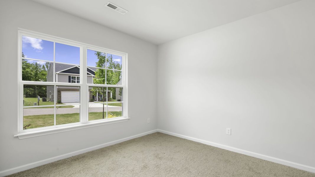 Spacious, unfurnished interior of a new home in Greystone North, Stoneville (Image 20).