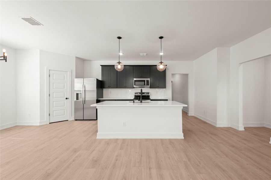 Furnished interior view inside a new home in Rancho San Gabriel, Georgetown (Image 7).