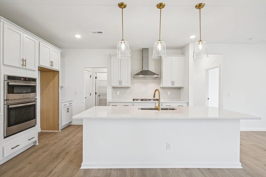 Kitchen featuring the AW Collection® Serene - Clean lines and earthy textures define the space.